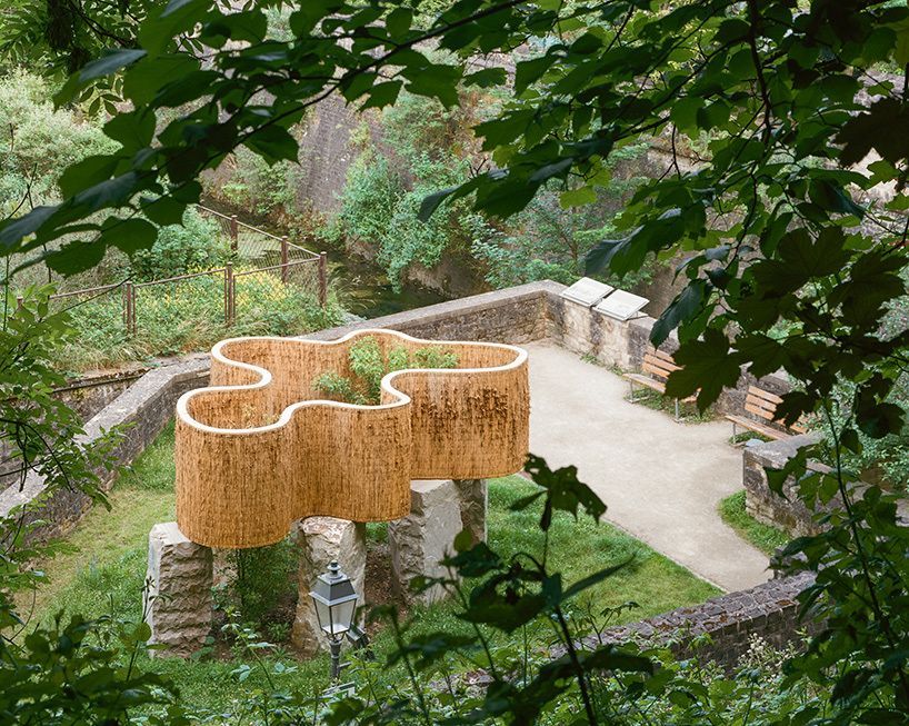 designboom's tweet image. atelier faber stacks reeds over luxembourg sandstone to revive soil porosity on old well site designboom.com/architecture/a…