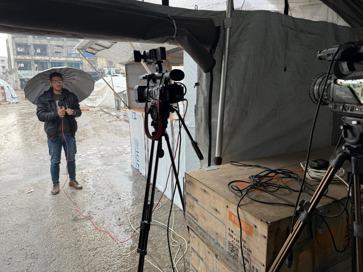 PalPress24's tweet image. Amid the rainy weather in the Gaza Strip, journalists continue their work from inside the Media Solidarity Center in Gaza City, which is affiliated with the Palestinian Journalists’ Syndicate.