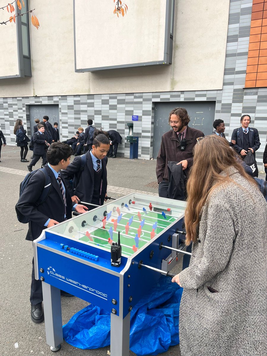 pimlicoacademy's tweet image. Hard at work or hardly working? Staff taking time out during lunch to join in with table football. Who won....Staff obviously! #PimlicoAcademy #Lunch #Activities