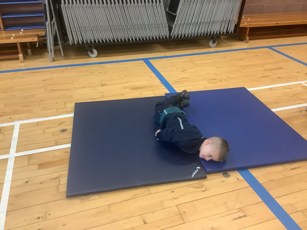P1/2 are learning how to balance and roll in their gymnastics lessons. They are showing great control and are having lots of fun in the process!