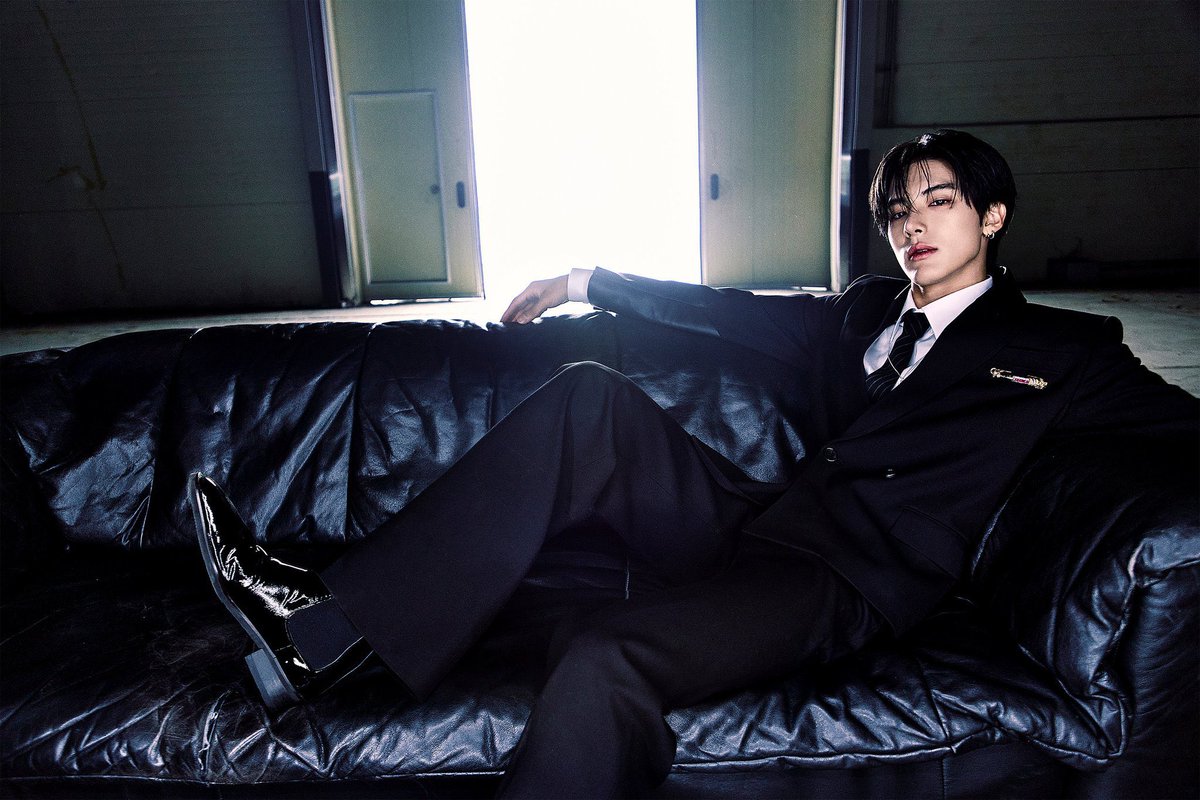 Drenched in shadows and silk, he moves like a whisper through a world of steel and stillness elegant, unreadable, and dangerously composed.