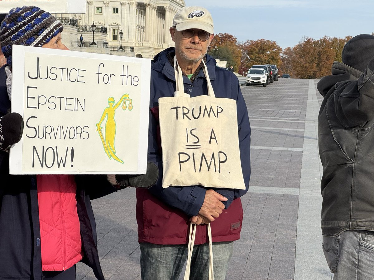 LauraLoomer's tweet image. Marjorie Traitor Greene’s supporters brought these anti-Trump signs to her Epstein press conference this morning, which is currently taking place. She’s bashing Trump alongside @RepThomasMassie and @RoKhanna. 

The signs accuse President Trump @POTUS of being a “Pimp”, feature…