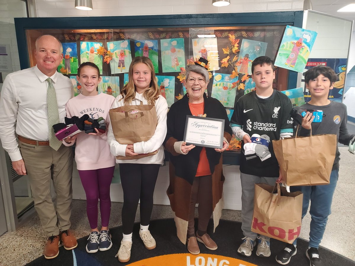 Faith Dixon, Kiwanis Club of LBI, was at the Long Beach Island Elementary School to accept the donation of 310 pairs of socks to their Happy Feet New Socks Project.  Thanks for all that you do for our community!