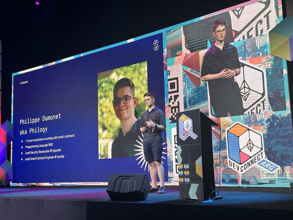 solidity_lang's tweet image. Taking the stage now is @real_philogy! He’s diving into Type-Driven Development, how to apply it to smart contracts, and what language features ‚Sensei‘, an experimental  language, adds to make it easier to deploy.