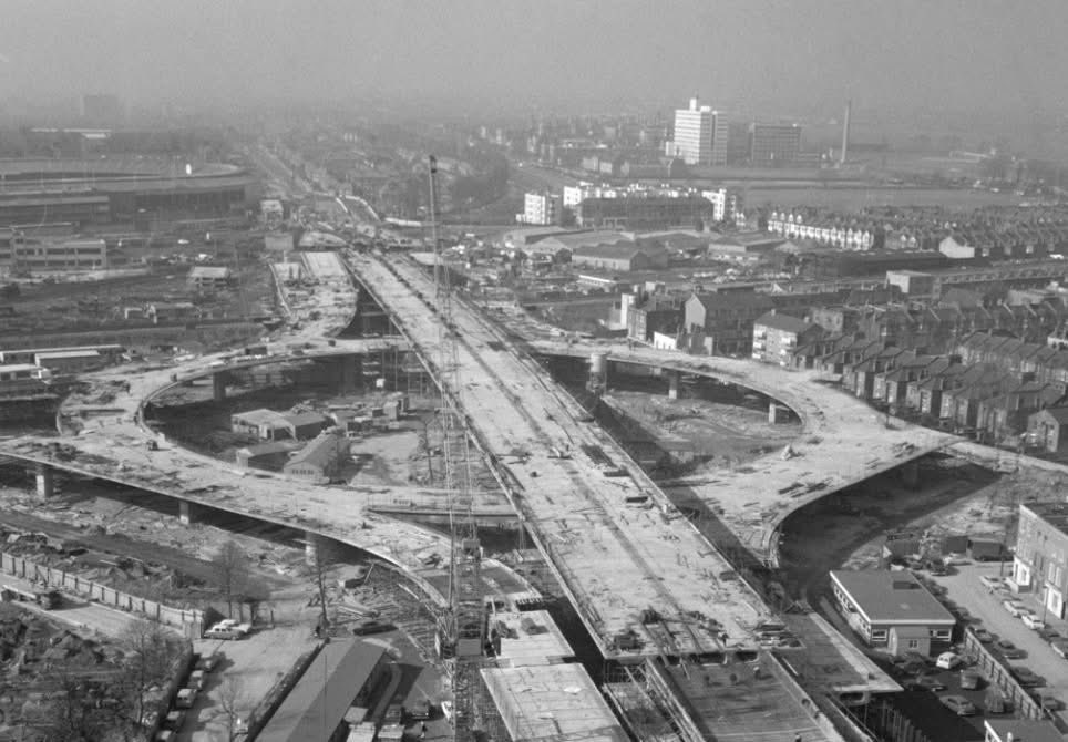 The roundabout at the end of The Westway under construction, 1960s. White City Stadium is top left