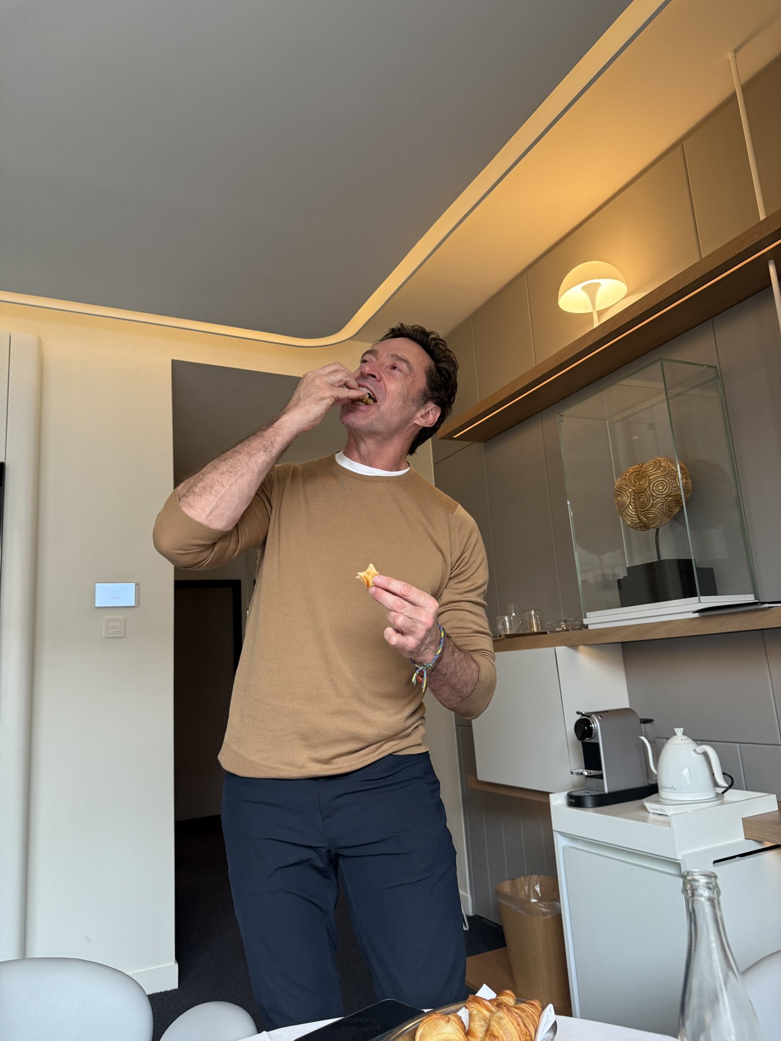 Hugh Jackman Enjoys Paris Croissants on Song Sung Blue Promo Tour