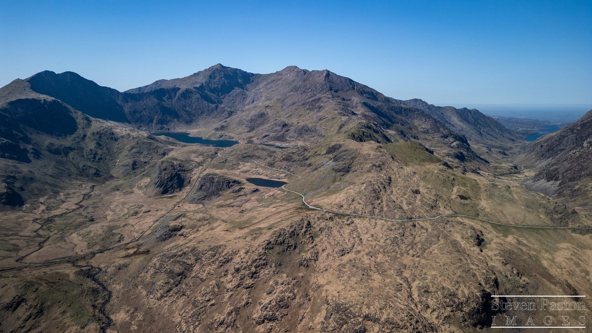 StevenPaston's tweet image. The view of top of Snowdon in the distance with  the Pgy Track and Miners Track in the foreground. While on a road trip I took back in April @DJIGlobal @StormHour #Mini3Pro