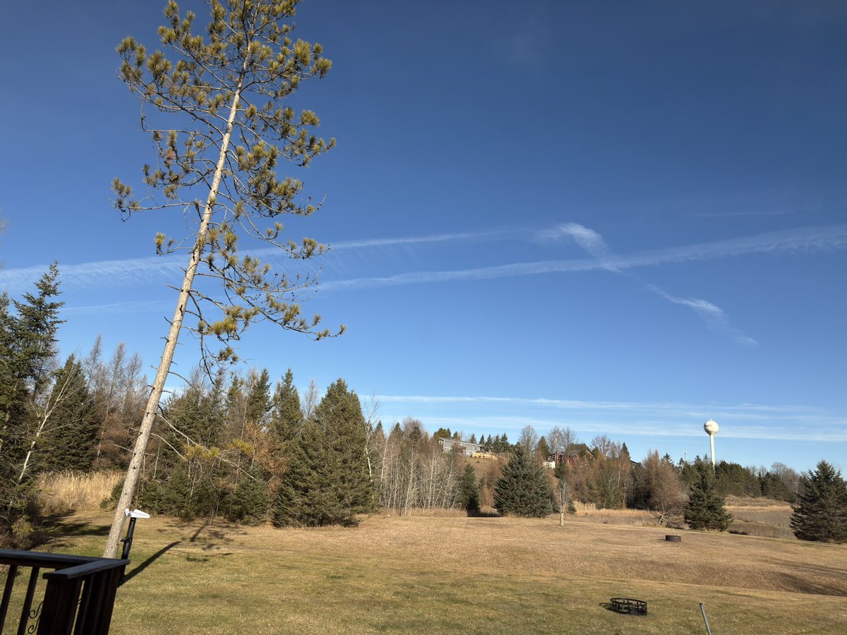 Not a cloud in the sky
I repeat not a CLOUD in the sky 
These are chemicals and micro metals 
I’ll bet if I go infront of my house there are even more 
NOTE THIS IS BEING DONE OVER THE GREAT LAKES  THE WORLDS LARGEST FRESH WATER SUPPLY