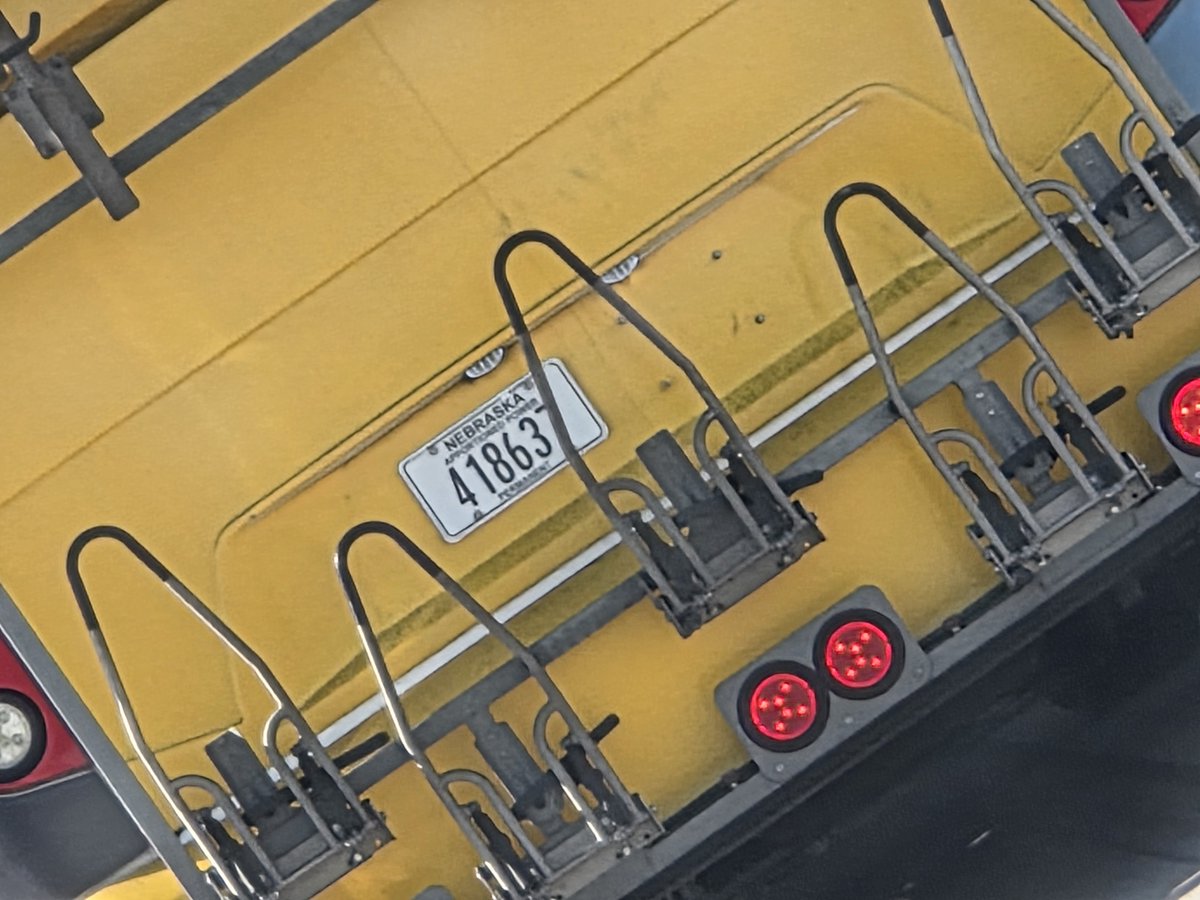 Why are ASU intercampus shuttle busses allowed to operate the out of state license plates?