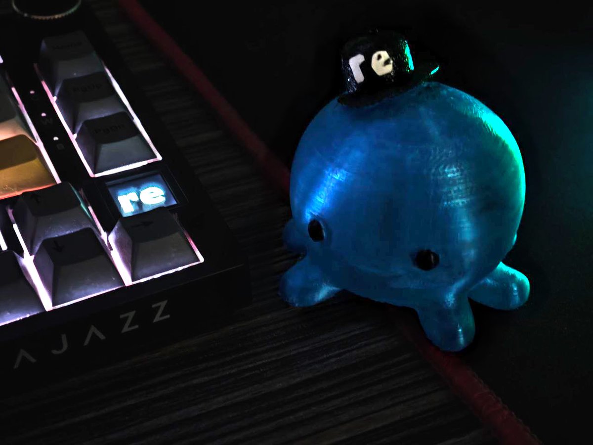 cryptotarolog's tweet photo. Not so long ago, I came up with the idea of doing something creative for @re. 

Now, take a look at this cutie, printed on 3D. Octo, as you know, is the mascot of the project and an integral part of our team❤️‍🔥

Now, his little copy will be working at my desk and will (re)ally bring me joy!