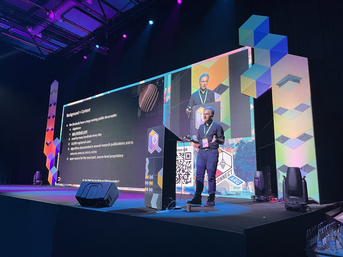 solidity_lang's tweet image. Now welcoming @YSmaragdakis! He’s breaking down why EVM decompilation is so challenging and why it’s essential for understanding deployed contracts, analyzing hacks, and large-scale code analysis.