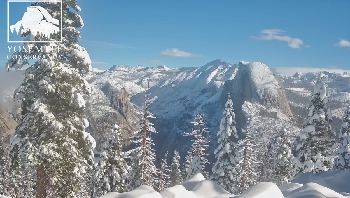 Fresh snow on Half Dome and the Yosemite backcountry after yesterday's storm. 

Like a picture out of National Geographic.