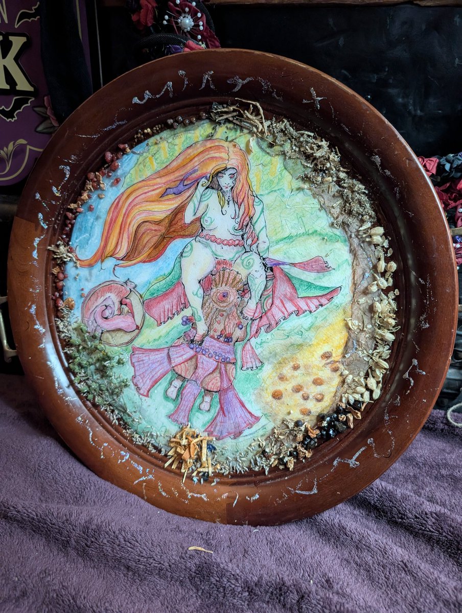 Finished. High Priestess/Empress.

Watercolor and micron. Wax finished. UV Resin, media, and herbs/incense.