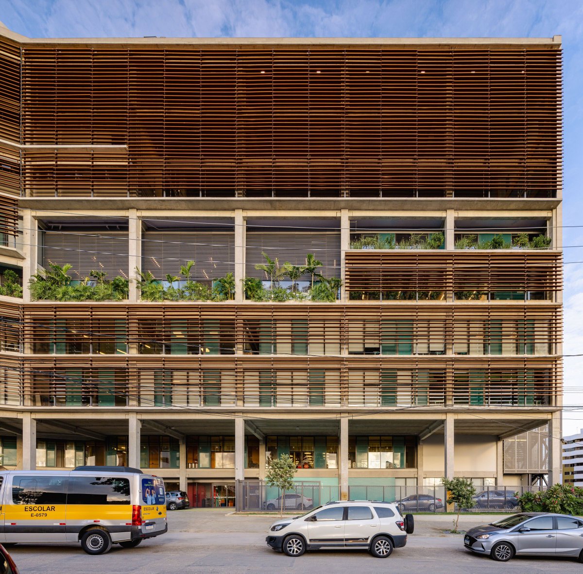 Archello's tweet image. BCMF Arquitetos’ Bernoulli School uses a modular prefabricated concrete system, solar-oriented brise-soleils, and exposed mechanical and acoustic systems to enhance efficiency, adaptability, and long-term performance.
archello.com/project/bernou… 

#ModularDesign #BriseSoleil