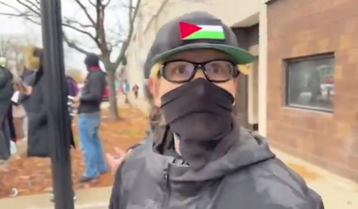 This FASCIST Antifa piece of shit in Dearborn Michigan, pepper sprayed Cam Higby in his eyes . Then proceeded to steal Cam's property and money.