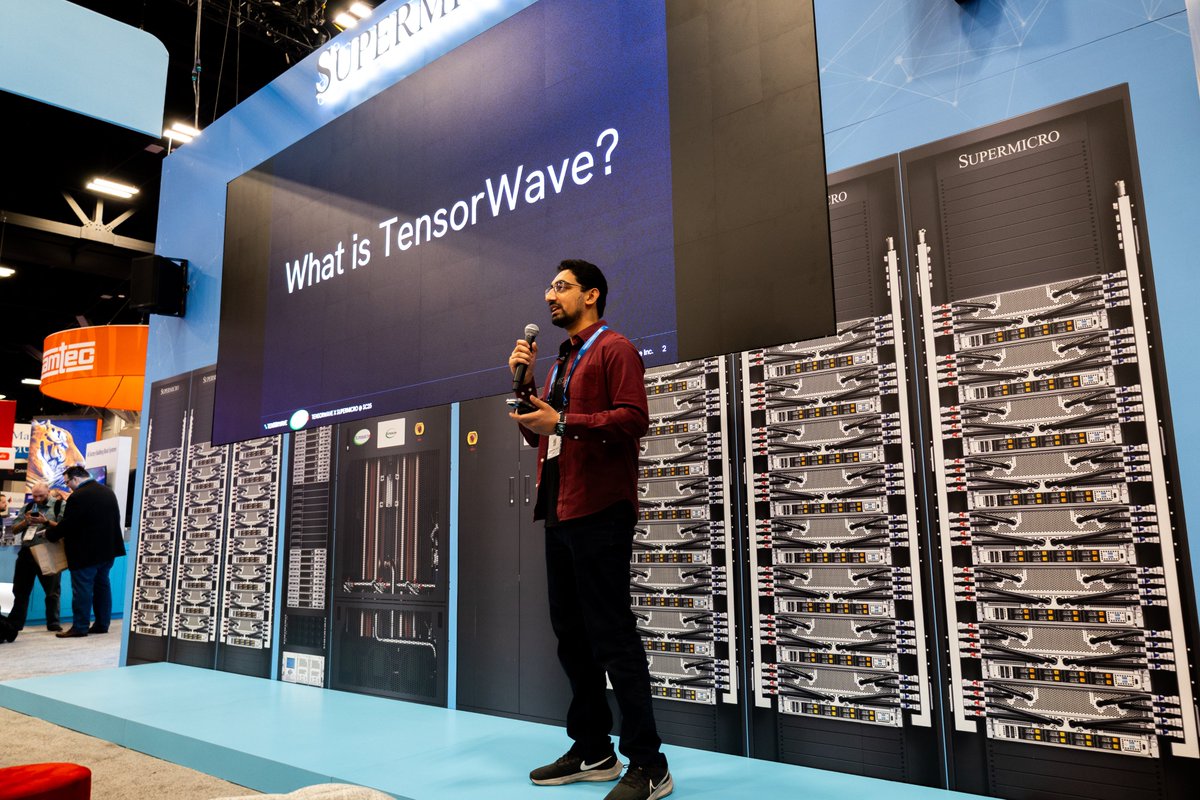 tensorwave's tweet image. Happening now at SuperCompute 2025 in St. Louis!

Nikhil Gupta from TensorWave is chatting with attendees about how @AMD  Instinct MI355X GPUs deliver breakthrough efficiency and scalability for enterprise AI workloads.

Learn how the TensorWave + @Supermicro + AMD stack is…