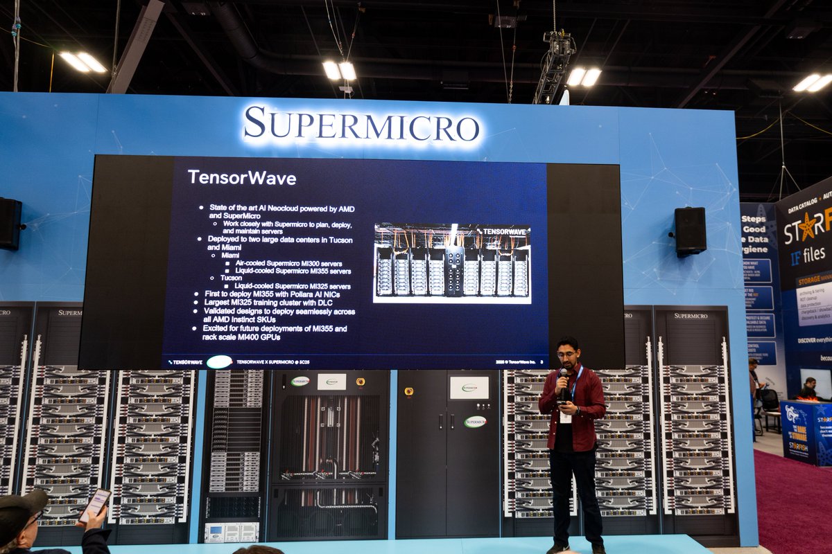 tensorwave's tweet image. Happening now at SuperCompute 2025 in St. Louis!

Nikhil Gupta from TensorWave is chatting with attendees about how @AMD  Instinct MI355X GPUs deliver breakthrough efficiency and scalability for enterprise AI workloads.

Learn how the TensorWave + @Supermicro + AMD stack is…