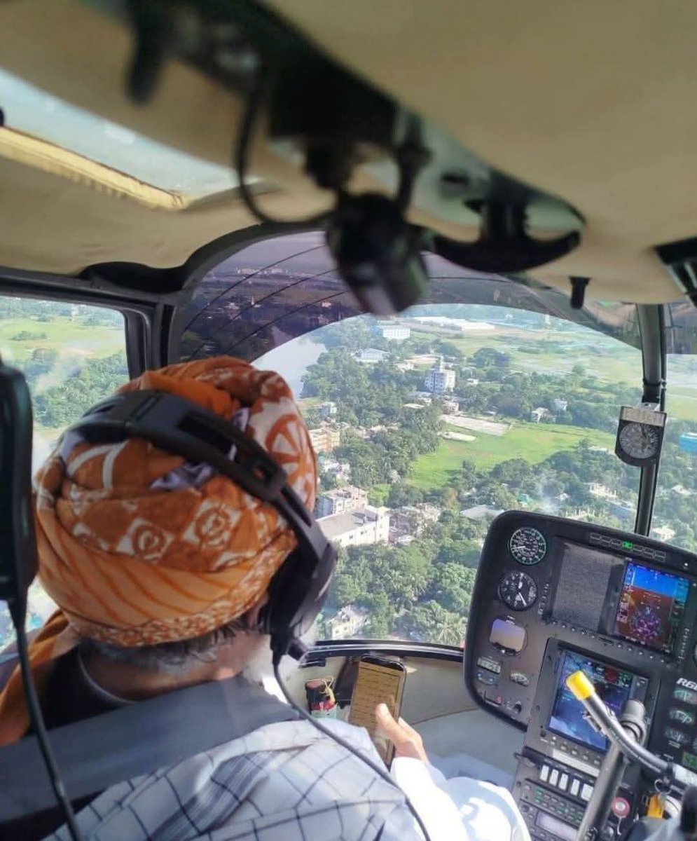 2222hollywood's tweet image. فرانسیسی ہیلی کاپٹر میں بیٹھ کر امریکی آئی فون پہ آیات کی تلاوت لگا کر حضرت قبلہ بنگلہ دیشیوں پہ رحمت نچھاور کر رہے ہیں