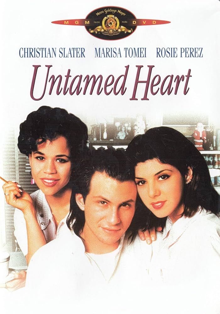 Untamed Heart (1993)

Tom Serchio, who wrote the script and also had a part as Marissa's dud date, originally had the story take place on Staten Island.