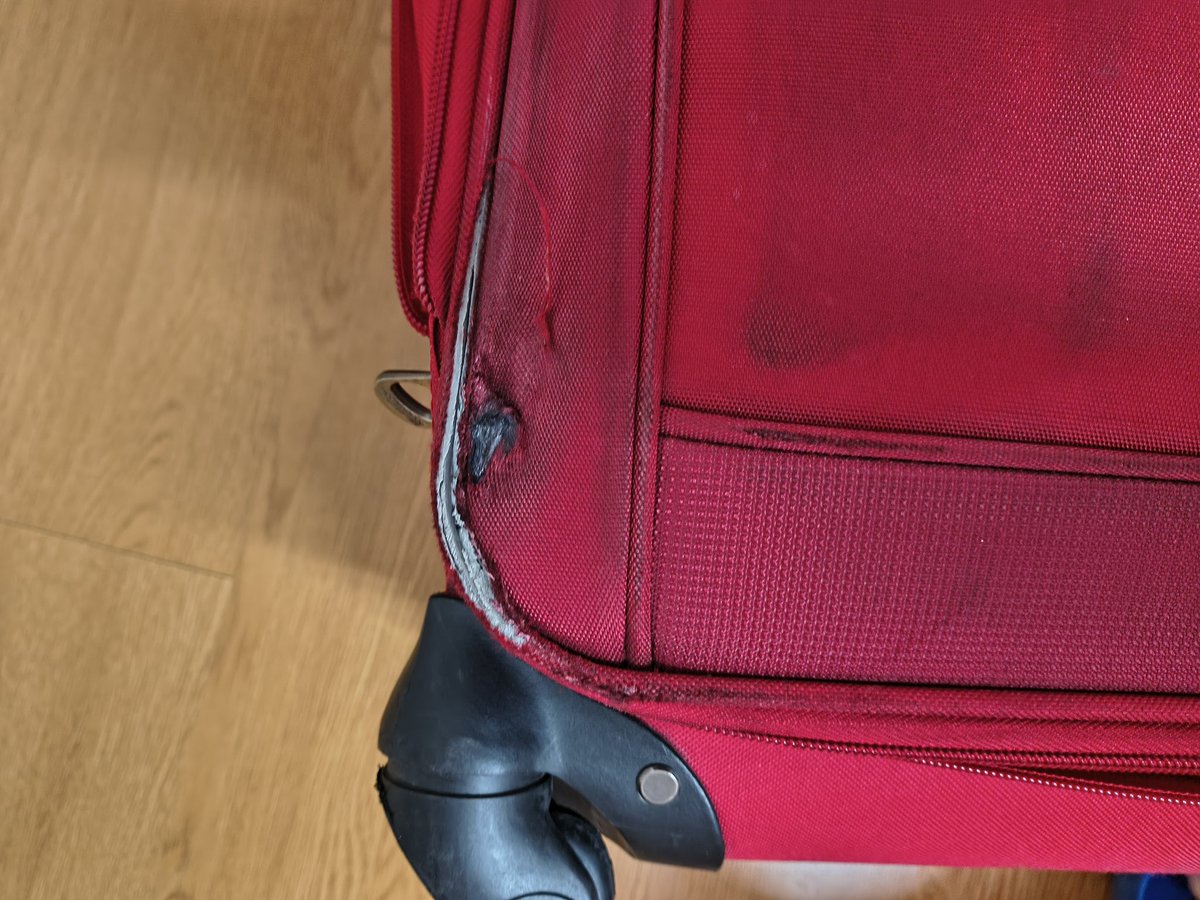 ank8tomar's tweet photo. @airindia Chicago to India... spoiled my entire trip experience. My new trolly bag was checked in...red became black, scratched, bruised and destroyed all over. Sad part I was in rush as flight was delayed so couldn't complain. Now they dont entertain. https://t.co/u3PQtlGSSB