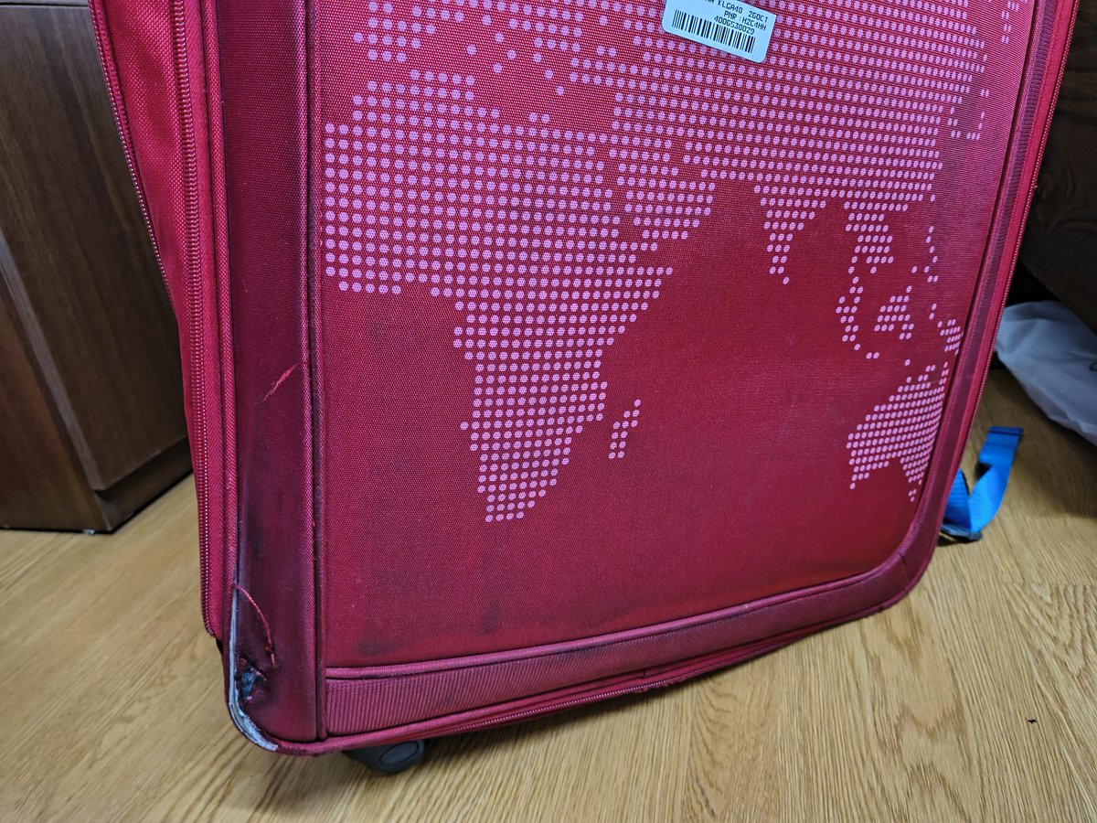 ank8tomar's tweet photo. @airindia Chicago to India... spoiled my entire trip experience. My new trolly bag was checked in...red became black, scratched, bruised and destroyed all over. Sad part I was in rush as flight was delayed so couldn't complain. Now they dont entertain. https://t.co/u3PQtlGSSB