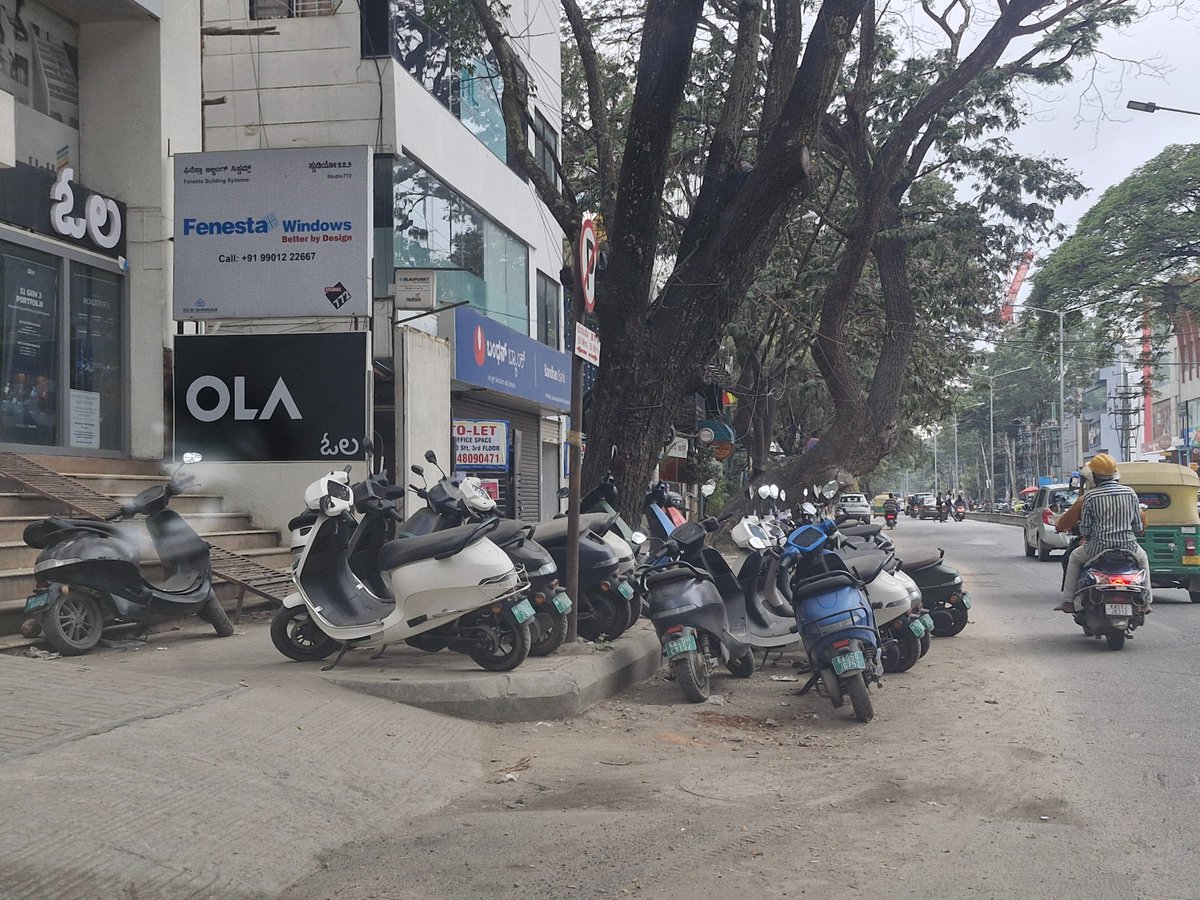 Uncouth uncivilized lack of business ethics, road footpath blocked  <a href="/OlaElectric/">Ola Electric</a> is back encroaching roads in Koramangala <a href="/VOfKoramangala/">Voice of Koramangala</a> <a href="/KoramangalaRWA/">I Am Koramangala</a> <a href="/kmangalaps/">Koramangala Police Station</a> <a href="/DKShivakumar/">DK Shivakumar</a>  <a href="/TVMohandasPai/">Mohandas Pai</a> <a href="/bhash/">Bhavish Aggarwal</a> <a href="/blrcitytraffic/">ಬೆಂಗಳೂರು ಸಂಚಾರ ಪೊಲೀಸ್ BengaluruTrafficPolice</a>
