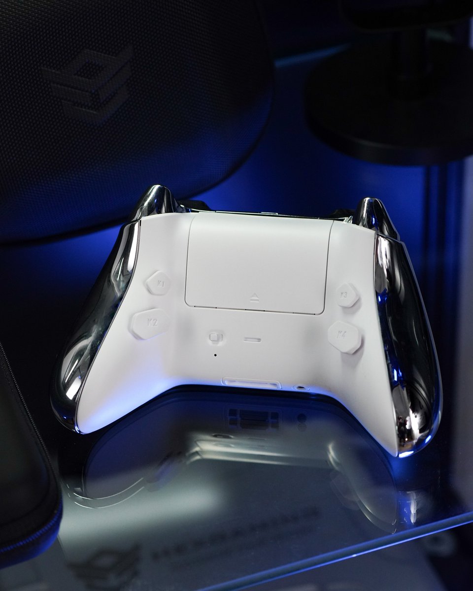 HexController's tweet image. Powered by 4 remappable back buttons and trigger stops, built for speed and precision in FPS gameplay.