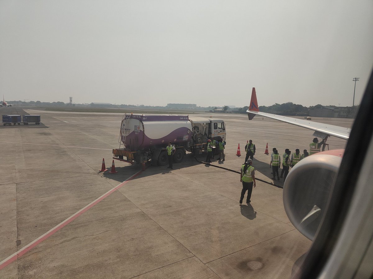 leo_patel_'s tweet photo. Flight no : QP1903 departure time is 11:40 am and these people fueling plane at 12:10.
When these guys will reach us at destination? 
@AkasaAir ?
@AdaniOnline
Ahmedabad to bagdogra... 
#flightdelay https://t.co/uHWOPP5DBi
