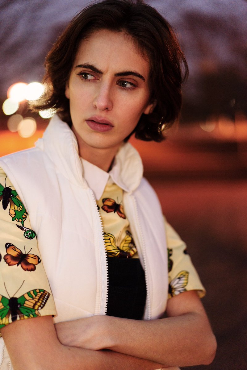 This was actually one of the more difficult shots I took in the past from a technical perspective. I shot it at F1.8, handheld @ 1/50s ISO100 while bouncing some flash to get the right look. No bokeh added or anything like that, just good old fashioned camera tricks