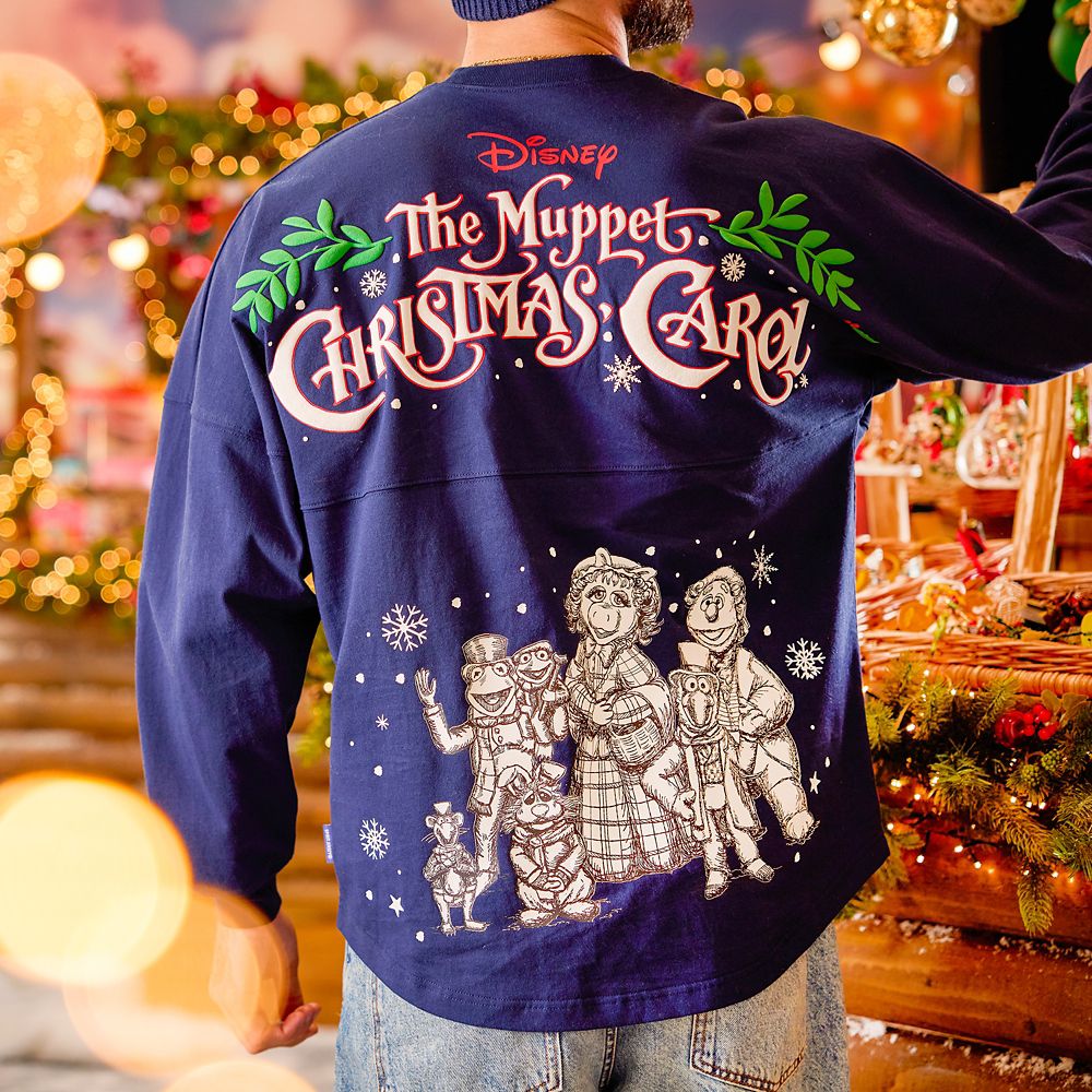 DisneyMerchShow's tweet image. Get festive this winter with the #MuppetsChristmasCarol Spirit Jersey! laughingplace.com/disney-merchan…