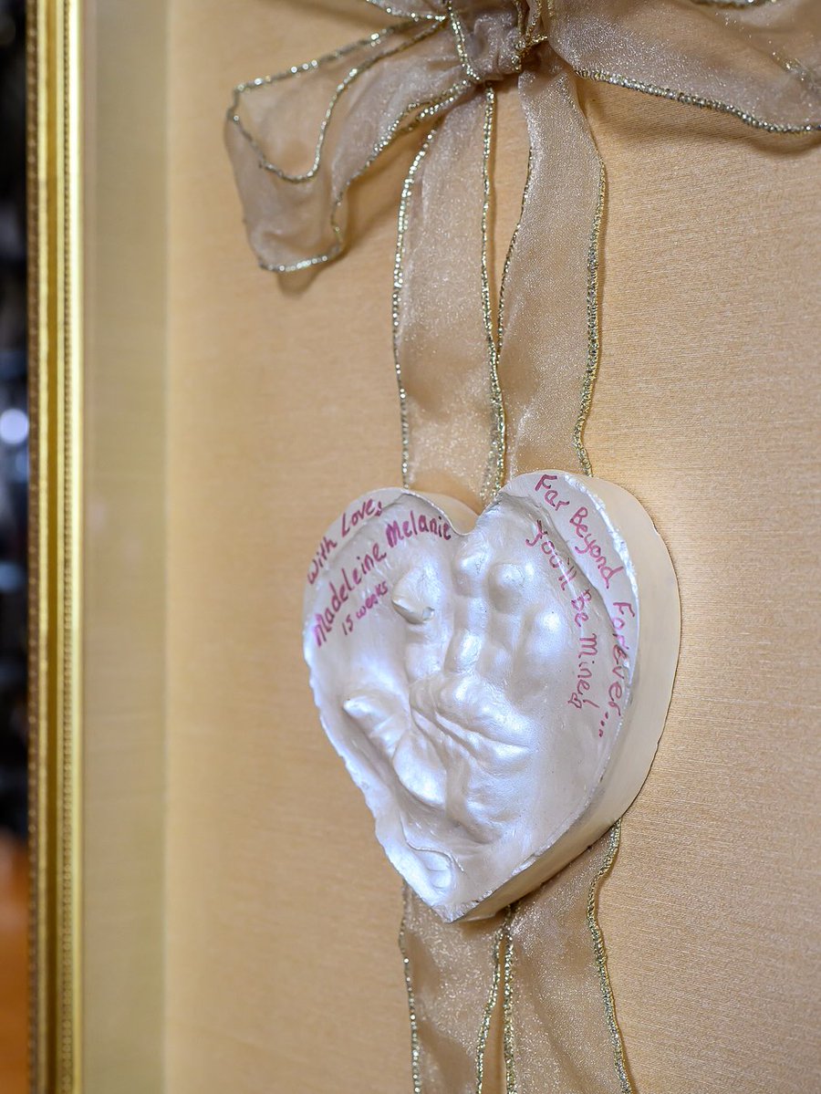 truvueglazing's tweet image. &quot;Sharing this beautiful piece, a keepsake meant to be held onto forever. We built a soft gold shadowbox around the heart-shaped hand’s imprint with a sheer ribbon and kept the design quiet so the love at its center could shine.&quot; –#UnderglassFraming #CreateSomethingSpecial #TruVue