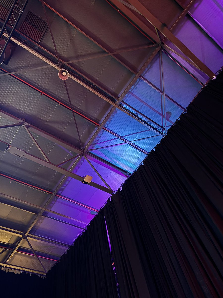 CatMcGeeCode's tweet image. Solana colours on the ceiling of devconnect