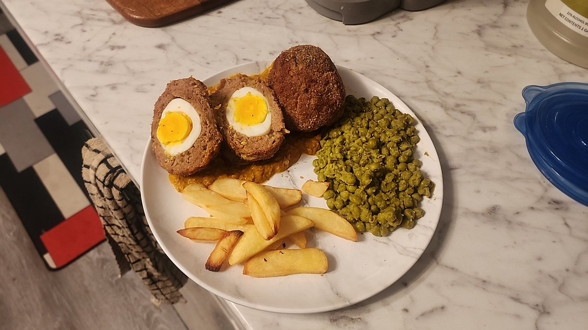Tried making scotch eggs last night! On a roasted pepper sauce with smashed peas and 'Chips' ! Hope I did the British pubs proud, is my fav food at out local one!