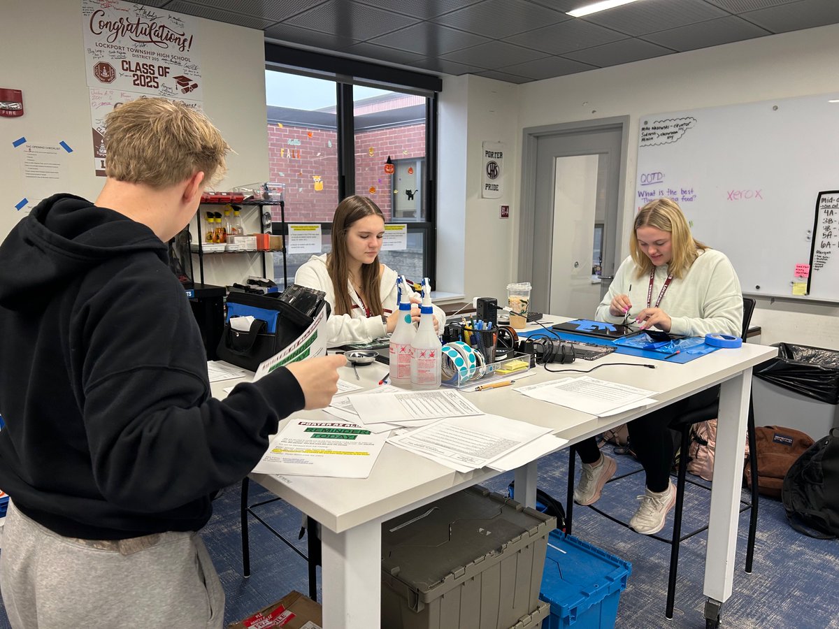 EdTechKate's tweet photo. No sleeping in for our student workers.  TAC Crew hard at work this Wednesday morning repairing Chromebooks so we can get them back to our students!  #edtech #porterpride @LockportHS205 https://t.co/BqpfOMyEyX