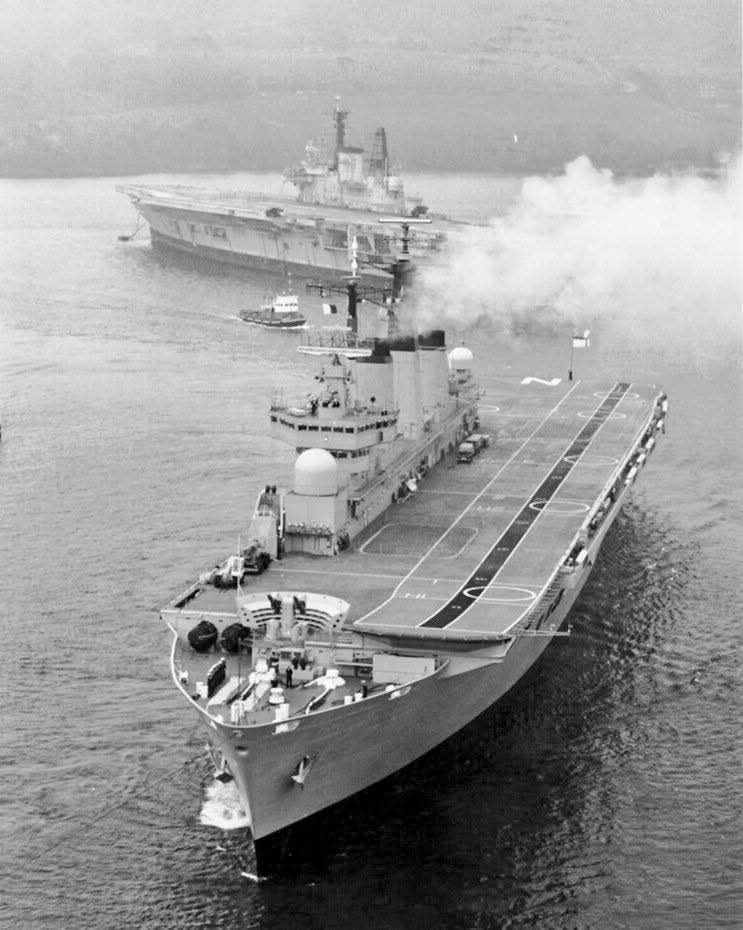 The brand new HMS Invincible passes the old Ark Royal at Devonport in 1980. I know the old RO9 was knackered but it's such a wonderful and enduring "what if" of the Falklands War.