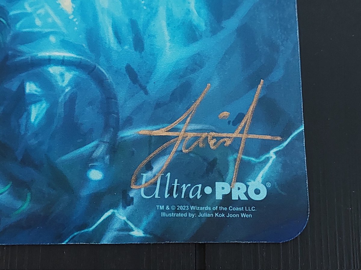 L@@k what the incredible <a href="/Julianimator/">Julian Kok</a> sent me as a gift! 😭 It's his art of the best Phyrexian Praetor Jin-Gitaxias! 💙🩵 It's such a gorgeous piece of art. I cannot wait to rock this playmat and show my friends at my LGS! Thank you so much Julian, I'll treasure it forever! 🙇‍♀️🙏