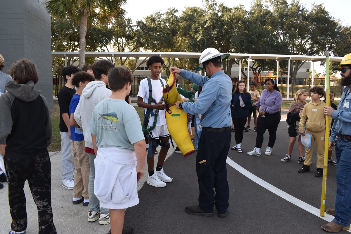 WRECCoop's tweet image. Yesterday, WREC linemen from our Bayonet Point office, Randy Tolle from our Bayonet Point office, and WREC linemen from our One Pasco office participated in multiple Great American Teach-In events! 
#wreccoop #GreatAmericanTeachIn #CommunityFirst