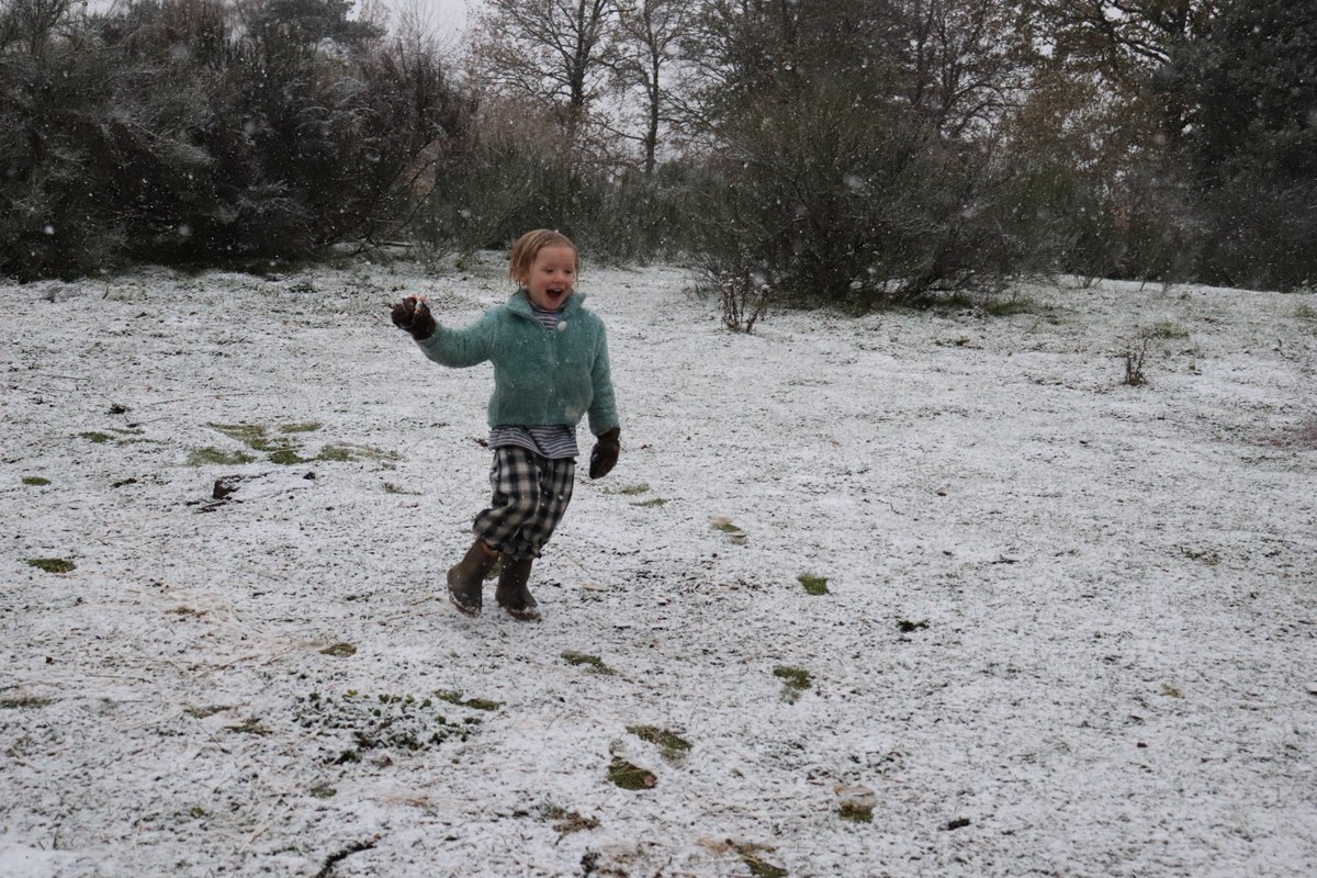 The incredible joy of the first snow on a face...