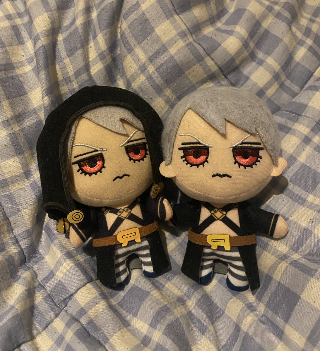 had a second baby so i could take off his hat and accesorize him but it was hot glued onto his hair and i burned the fabric in the process of removing it so i felted it all over . the point is look at them