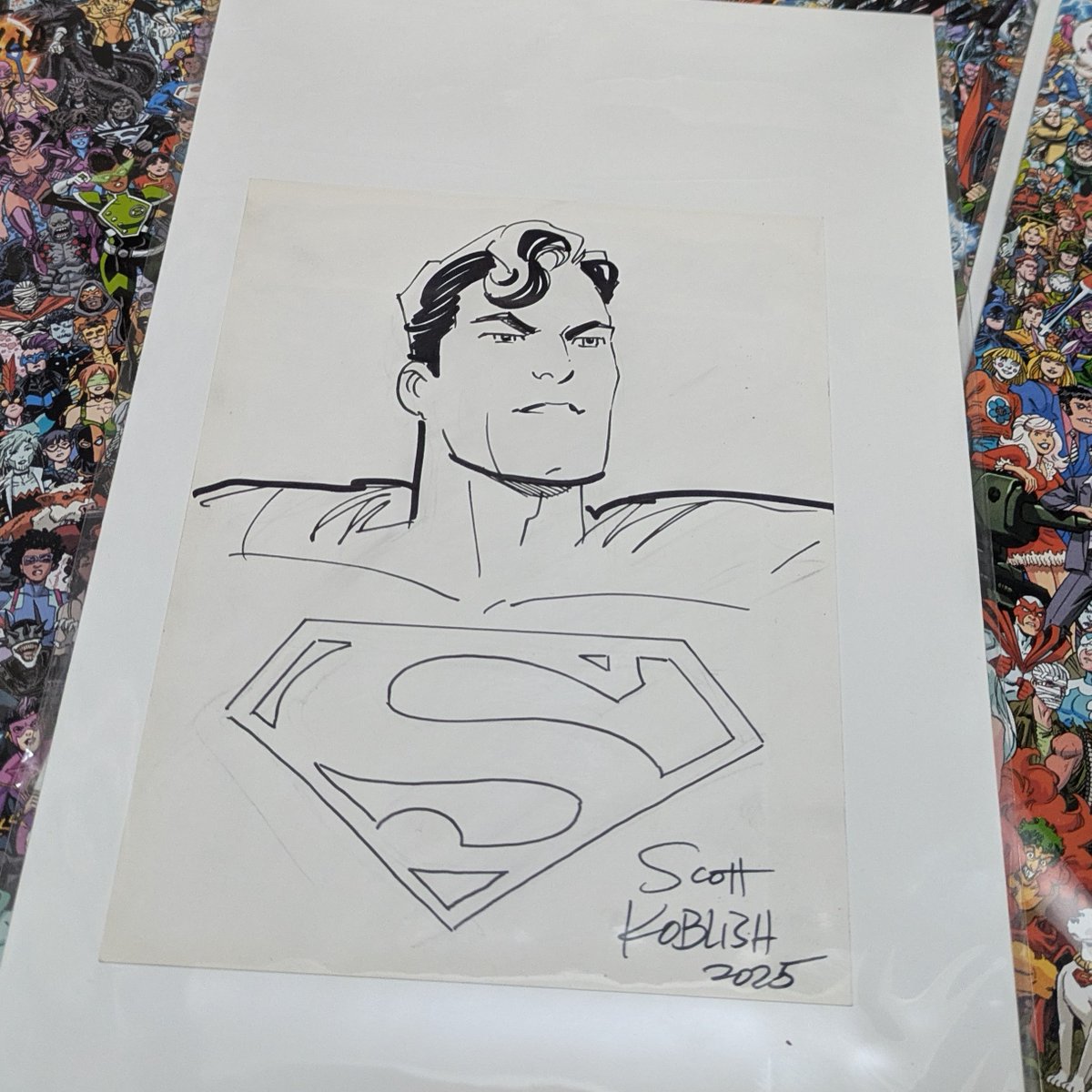 Finally went to <a href="/cparadize/">Collector's Paradise</a> and picked up my signed copies of History of DC Universe which included a nice Superman sketch by Scott Koblish