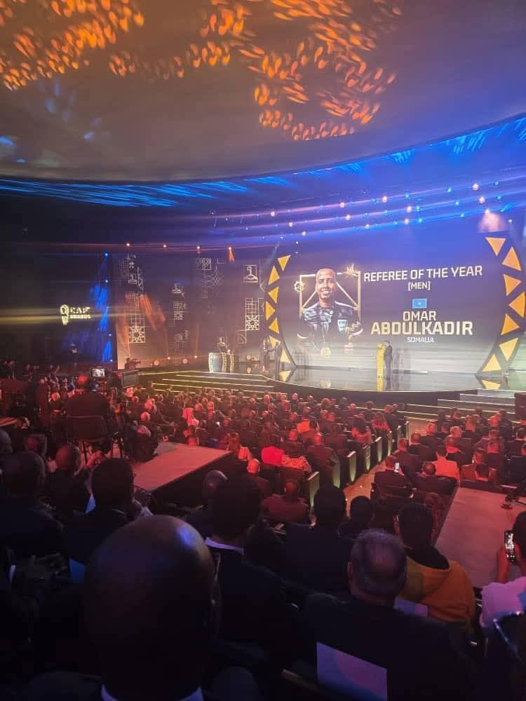 SharmarkeAMB's tweet photo. **“Somali international referee Omar Abdulkadir Artan has been chosen as the Best Referee in Africa 2025.

Referee Omar competed for this award with two other referees from South Africa and Mauritius. https://t.co/4skupnZoj5