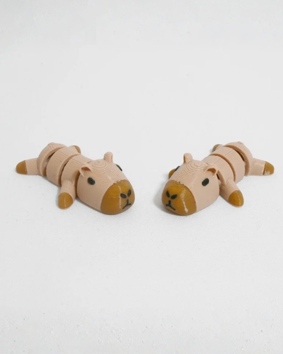thingiverse's tweet image. Capybara! Capybara! Capybara! 🧡 3D print the most adorable, multi-color Capybara mini. No supports needed. Download the free model now: ow.ly/h8vX50Xtj4H 🔗 Designed by Fulcrum_Studio #thingiverse #3dprinting #multicolor