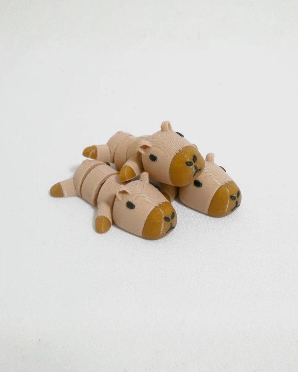 thingiverse's tweet image. Capybara! Capybara! Capybara! 🧡 3D print the most adorable, multi-color Capybara mini. No supports needed. Download the free model now: ow.ly/h8vX50Xtj4H 🔗 Designed by Fulcrum_Studio #thingiverse #3dprinting #multicolor