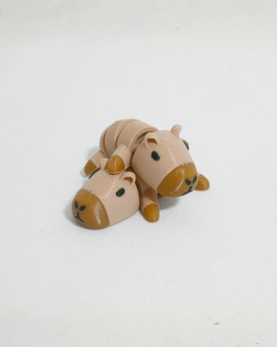 thingiverse's tweet image. Capybara! Capybara! Capybara! 🧡 3D print the most adorable, multi-color Capybara mini. No supports needed. Download the free model now: ow.ly/h8vX50Xtj4H 🔗 Designed by Fulcrum_Studio #thingiverse #3dprinting #multicolor