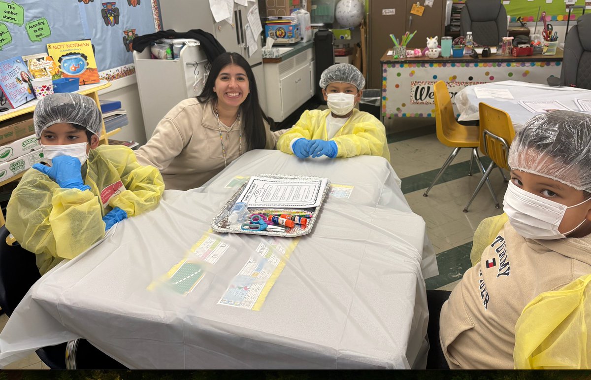 EDETIGERS's tweet image. 🩺💡 Today Ms. Feldman’s 4th grade, our Tigers transformed into “text-feature surgeons”! They put on gloves, masks &amp;amp; hair caps, then cut out headings, captions, and more from nonfiction texts — pasting them into patient files and explaining their purpose. @LJaime13  #LiteracyFun