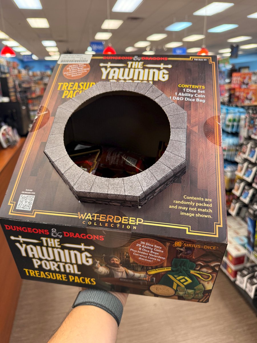 Yawning Portal Treasure Packs: I have the sickest packaging design ever!
Undermountain Treasure Packs: Hold my beer ...

Mimic Mystery Dice: Nothing to see here. I'm just a box, you can trust a box.