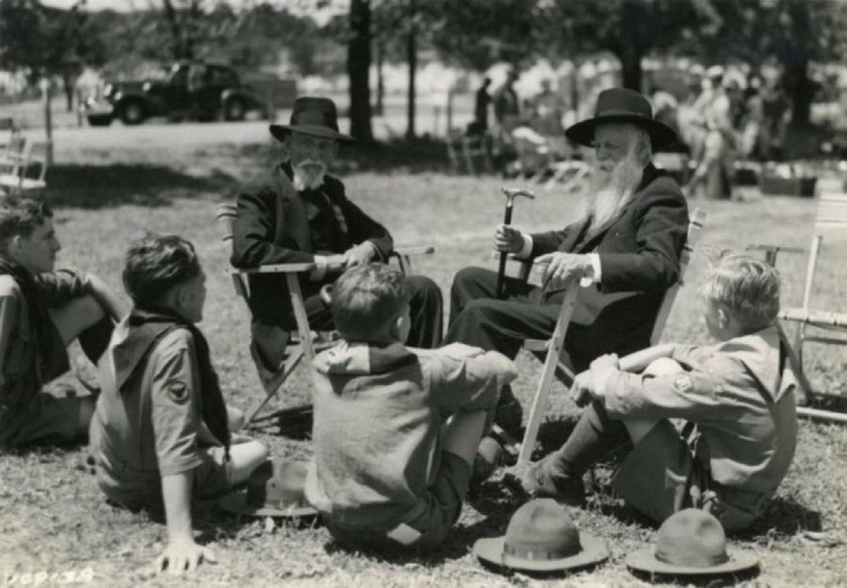 Union veterans telling stories to a group of Boy Scouts at the 75th Anniversary of the Battle of Gettysburg in 1938.