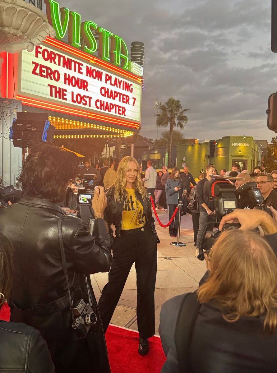 SaltyBoii03's tweet photo. Uma Thurman (The Bride from Kill Bill) has now arrived at the Vista Theatre Event taking place live in LA for Fortnite Chapter 7 stuff! 👀

Below is Quentin Tarantino &amp; Uma Thurman posing with the Meow Wagon (Pussy Wagon) that will most likely be getting added to Fortnite soon! https://t.co/kE2Xfsnp9I