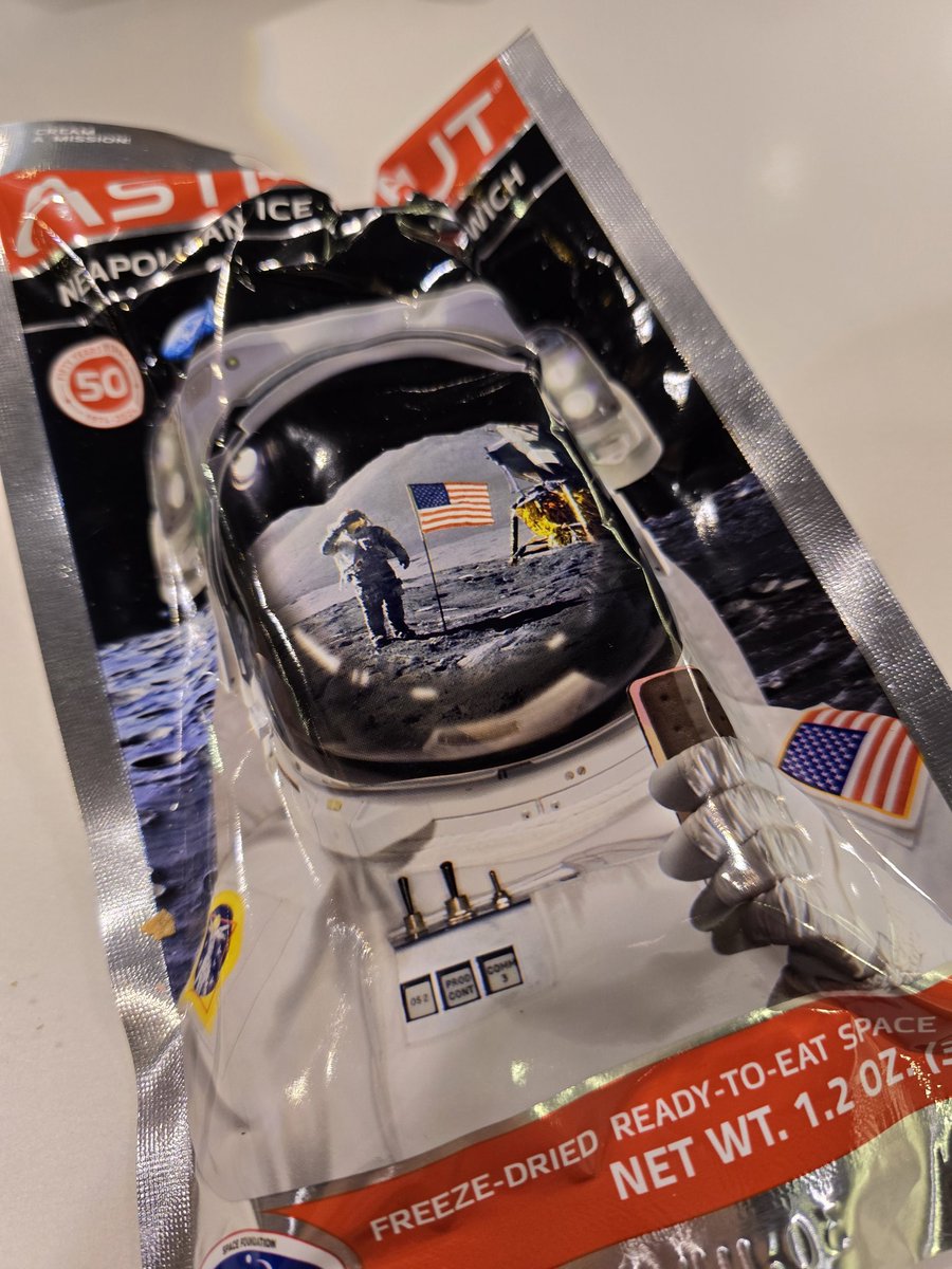 Trying astronaut ice cream with my daughter at the Smithsonian Air and Space museum in Washington DC.