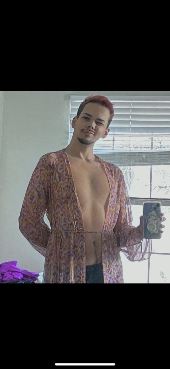 archive_janet's tweet image. A man with a woman’s blouse and pink hair is trying to call somebody soft. You do this shit on the internet, that’s about it.